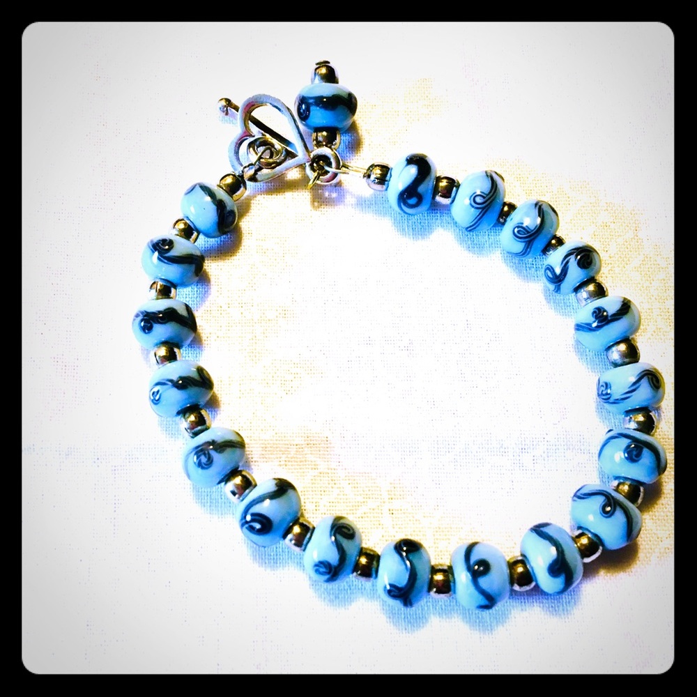 Blue designed swirl silver bracelet w/ heart clasp
